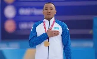 Ербол Хамитов чемпион Паралимпийских игр Милан Кортина золото парабиатлон бронза лыжные гонки