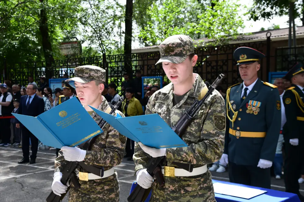 Военно-патриотическое шествие в Университете Абая к Дню защитников Отечества {city2}